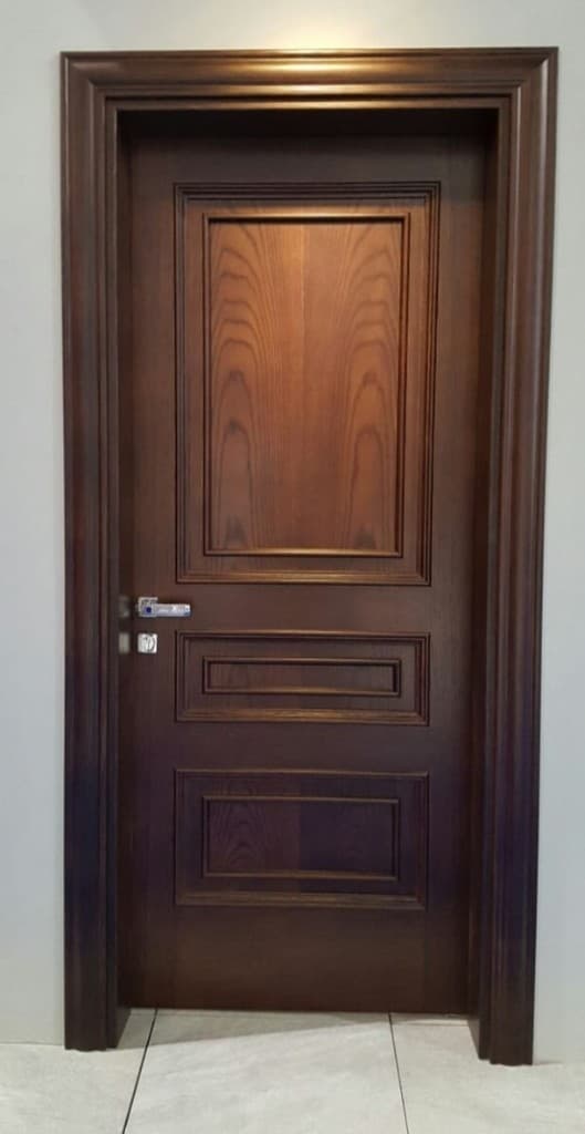 Three-panel walnut interior door with silver handle