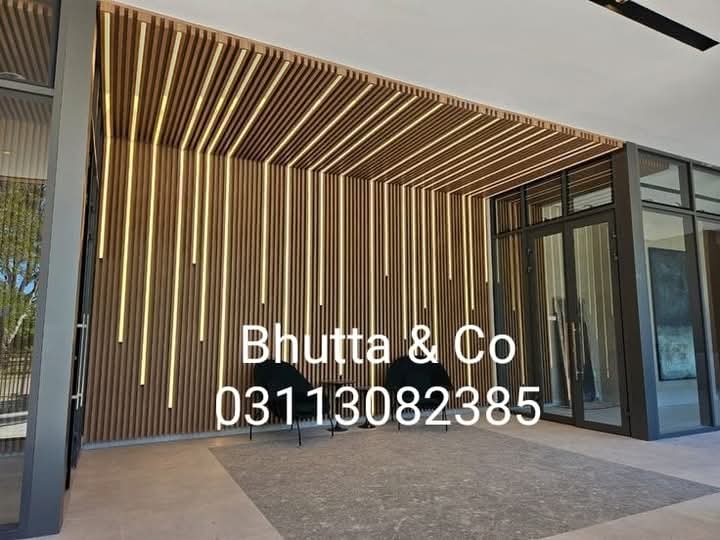 Vertical wood wall cladding in a living space
