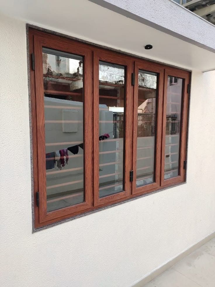 Finished wooden window with hardware details